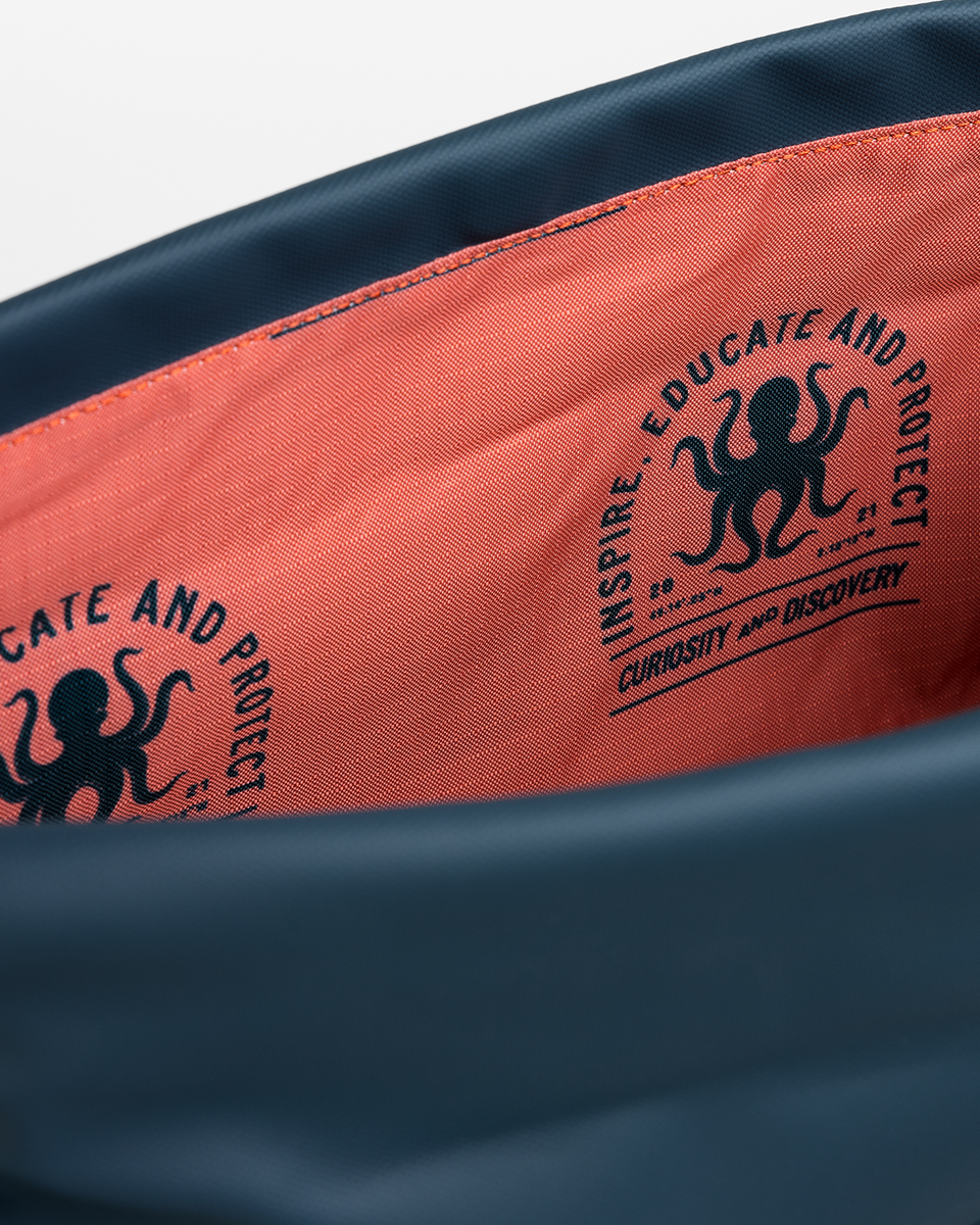 A cobranded Roll Top in blue for Ocean Culture