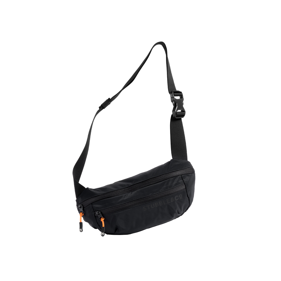A studio shot of the front and side of a Packable Sling as cut out transparent PNG- black