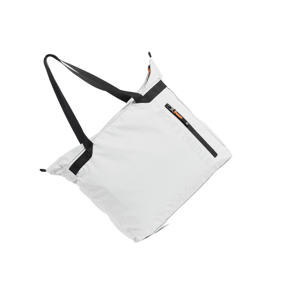 A studio shot of the front and side of a Packable Tote as cut out transparent PNG-  white