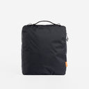 A studio shot of the back of an All Black packing cube 11l