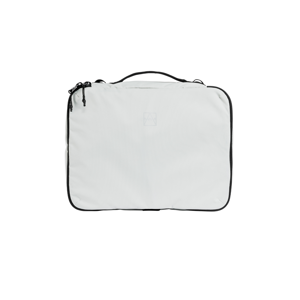 A studio shot of the front and side of a Packing Cube 8l as cut out transparent PNG-  white