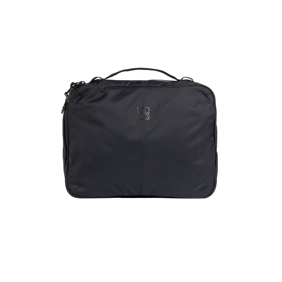 A studio shot of the front and side of a Packing Cube 2.5l as cut out transparent PNG-  black