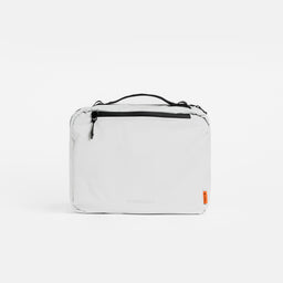 A studio shot of the back of an Off-White packing cube 8l