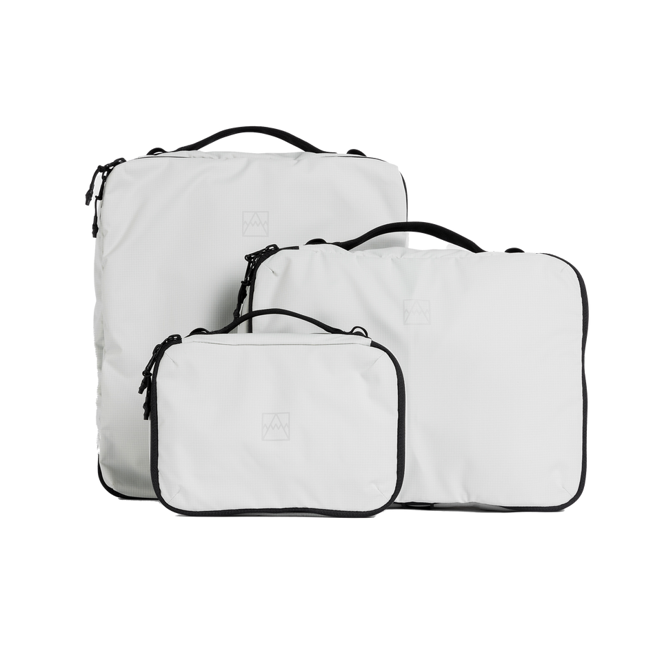 A studio shot of the front and side of a Packing Cube set of 3 as cut out transparent PNG-  white