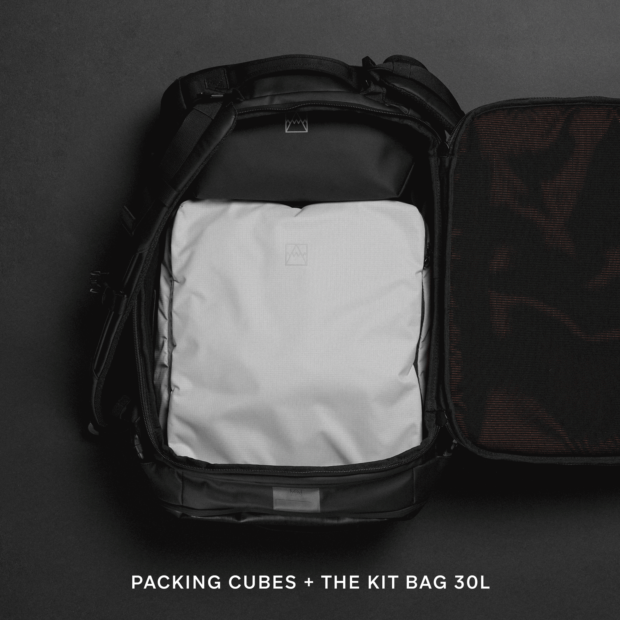 A gif of how the packing cubes fit into other Stubble and Co bag Off-White