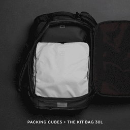 A gif of how the packing cubes fit into other Stubble and Co bag Off-White