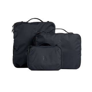 A studio shot of the front and side of a Packing Cube set of 3 as cut out transparent PNG- black
