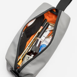 A studio shot of the packed interior of the pencil case in Concrete