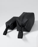 A studio shot of the Wash Bag and Wash Bag Mini side by side  Sand