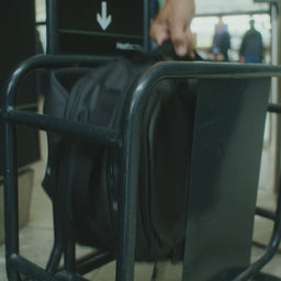 The campaign video of the Hybrid Backpack 30L in Sand, Midnight Blue and All Black showing a man utilising the backpack throughout the city of New York