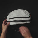 How to pack and fold the Ultra Light Sling packable, which comes in Off White and All Black