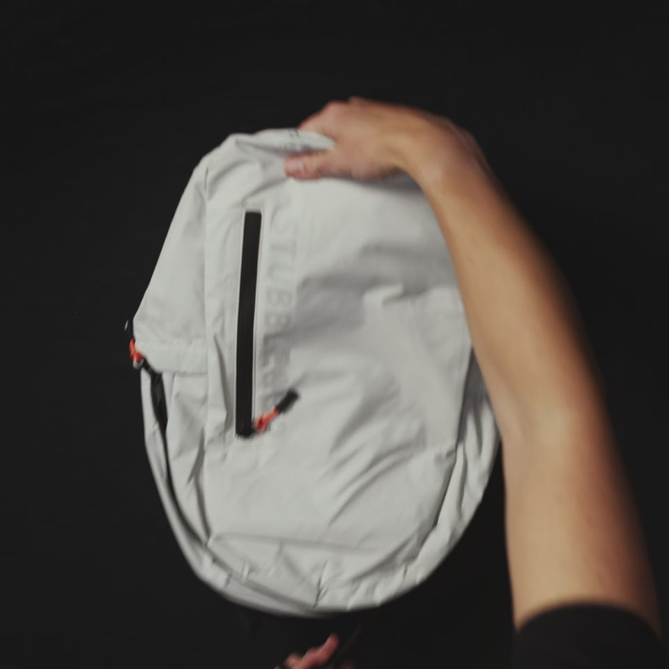 How to pack and fold the Ultra Light Backpack packable, which comes in Off White and All Black