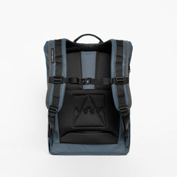 A studio shot of the adjustable chest straps and shoulder straps on the Tasmin Blue on the Roll Top 15L