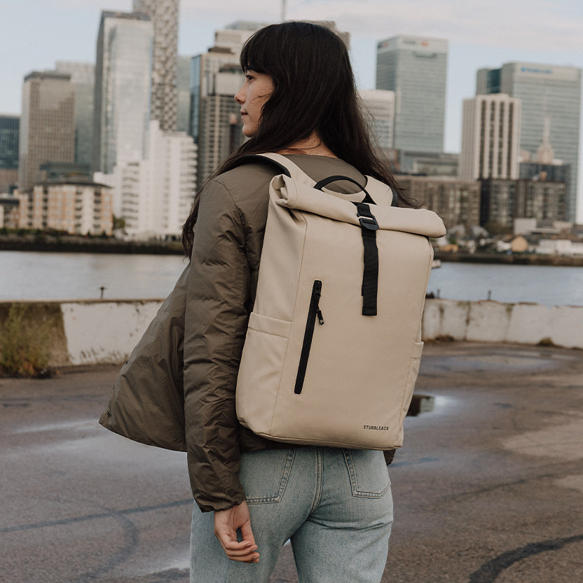 Women wearing The Roll Top 15L in Sand in a city