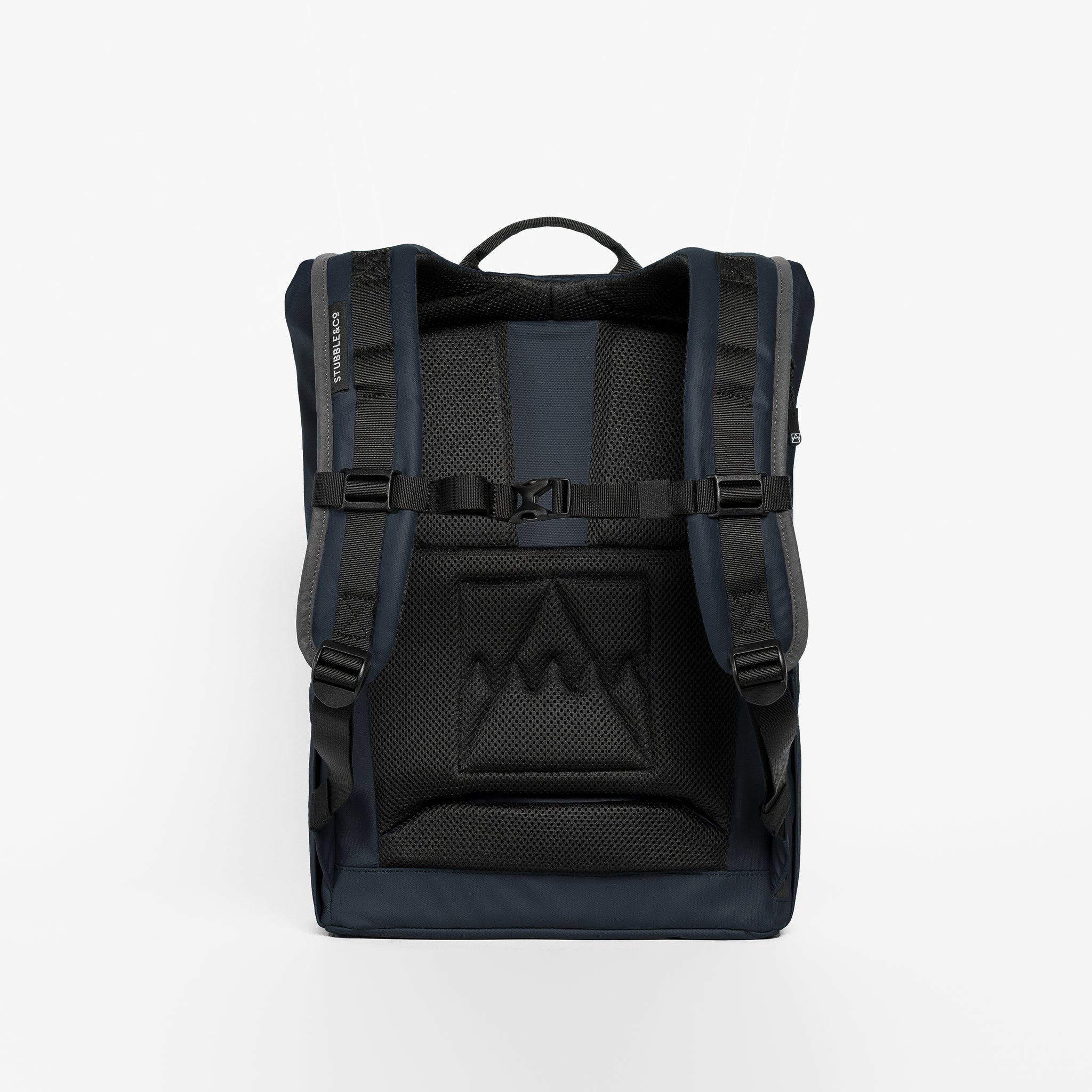 A studio shot of the back panel on a Roll Top 15L in Midnight Blue
