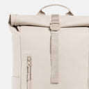 A studio shot of the close up of the g-hook and roll on the Roll Top 15L in Tonal Sand