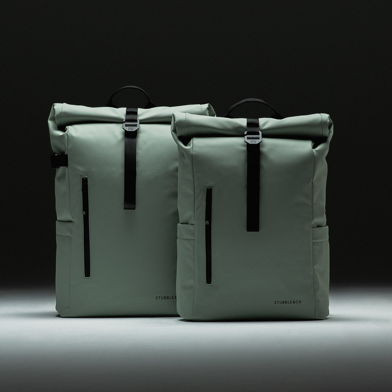 A studio shot of a Roll Top 15L in Soft Mint side by side