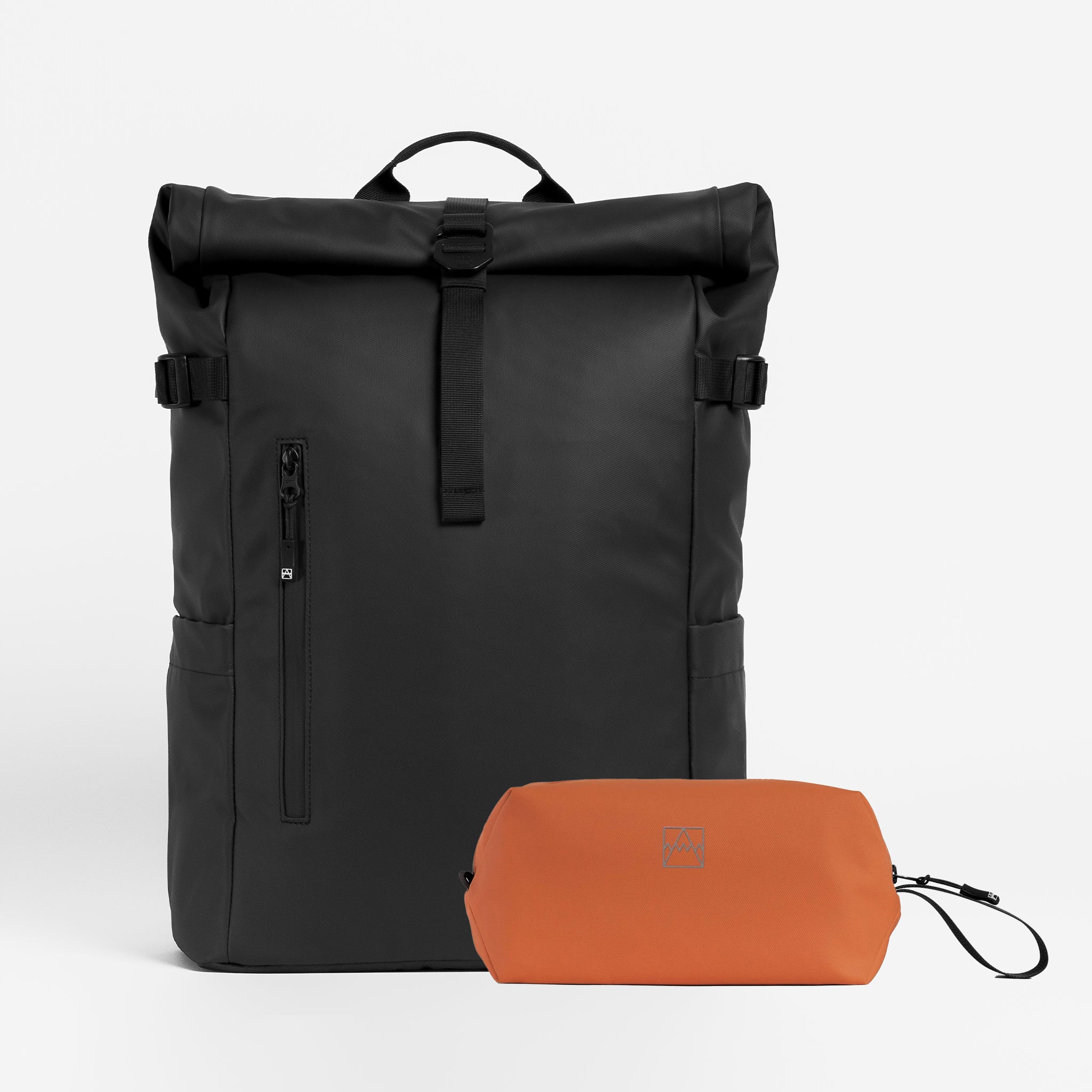 A studio shot of the Roll Top 20L All Black / Rust Wash Bag Bundle