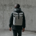 Man wearing The Roll Top 20L in Concrete
