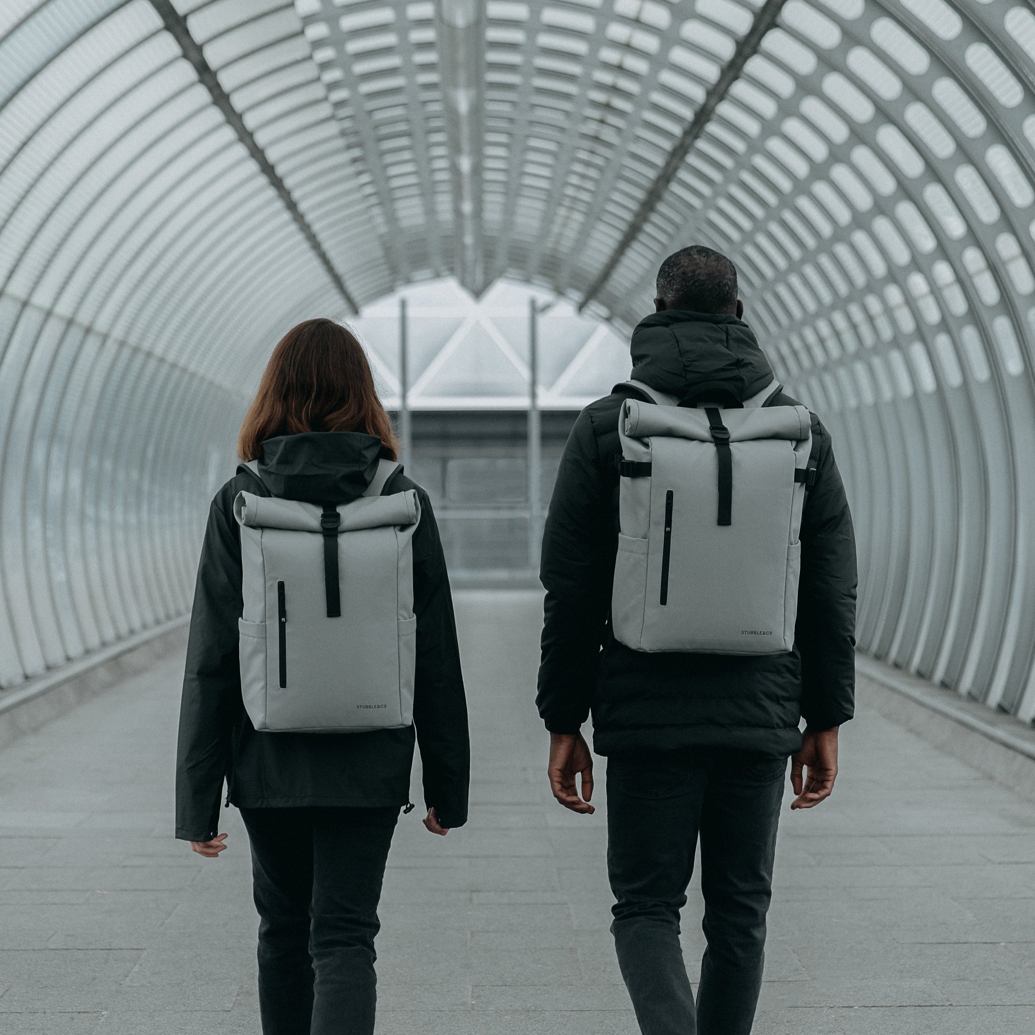 Man and women wearing The Roll Top in Concrete