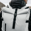 Person wearing The Roll Top 20L in Arctic White