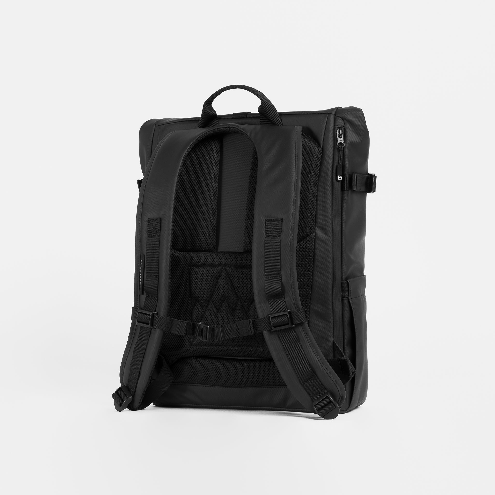 A studio shot of the back panel and shoulder straps on a Roll Top 20L in All Black
