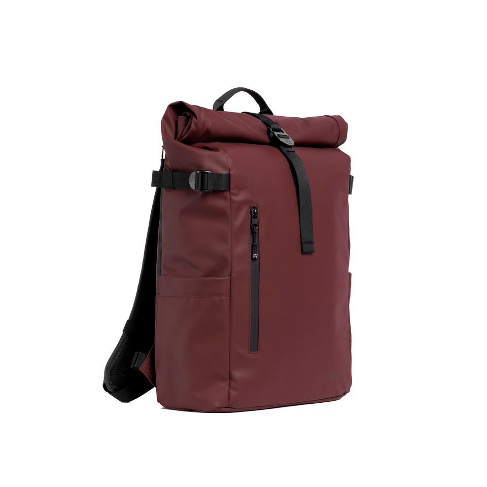 A studio shot of the front and side of a Roll Top 20L as cut out transparent PNG-  red