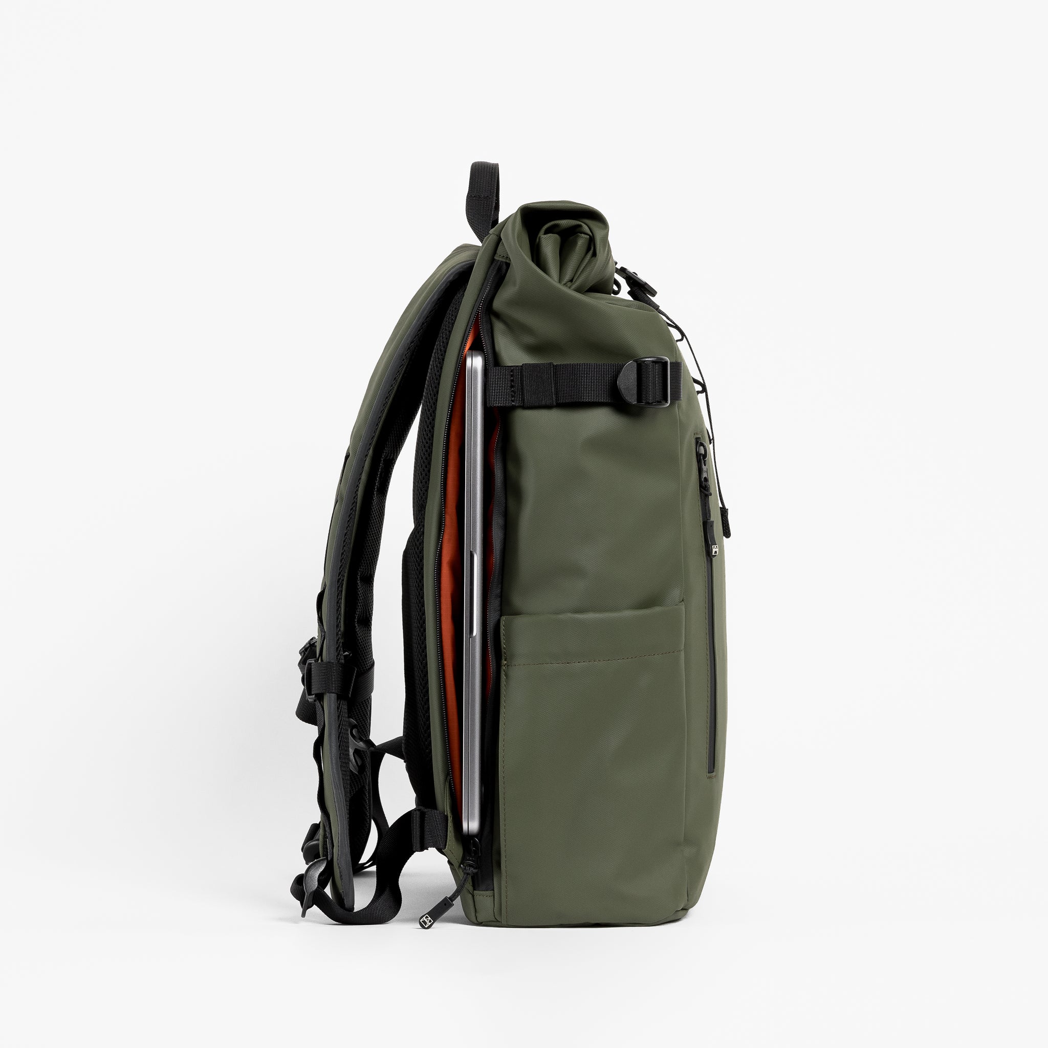 Side view of The Roll Top in Urban Green with laptop compartment
