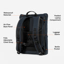 A studio shot of the back of a Roll Top 20L in Midnight Blue with the features annotated on the images