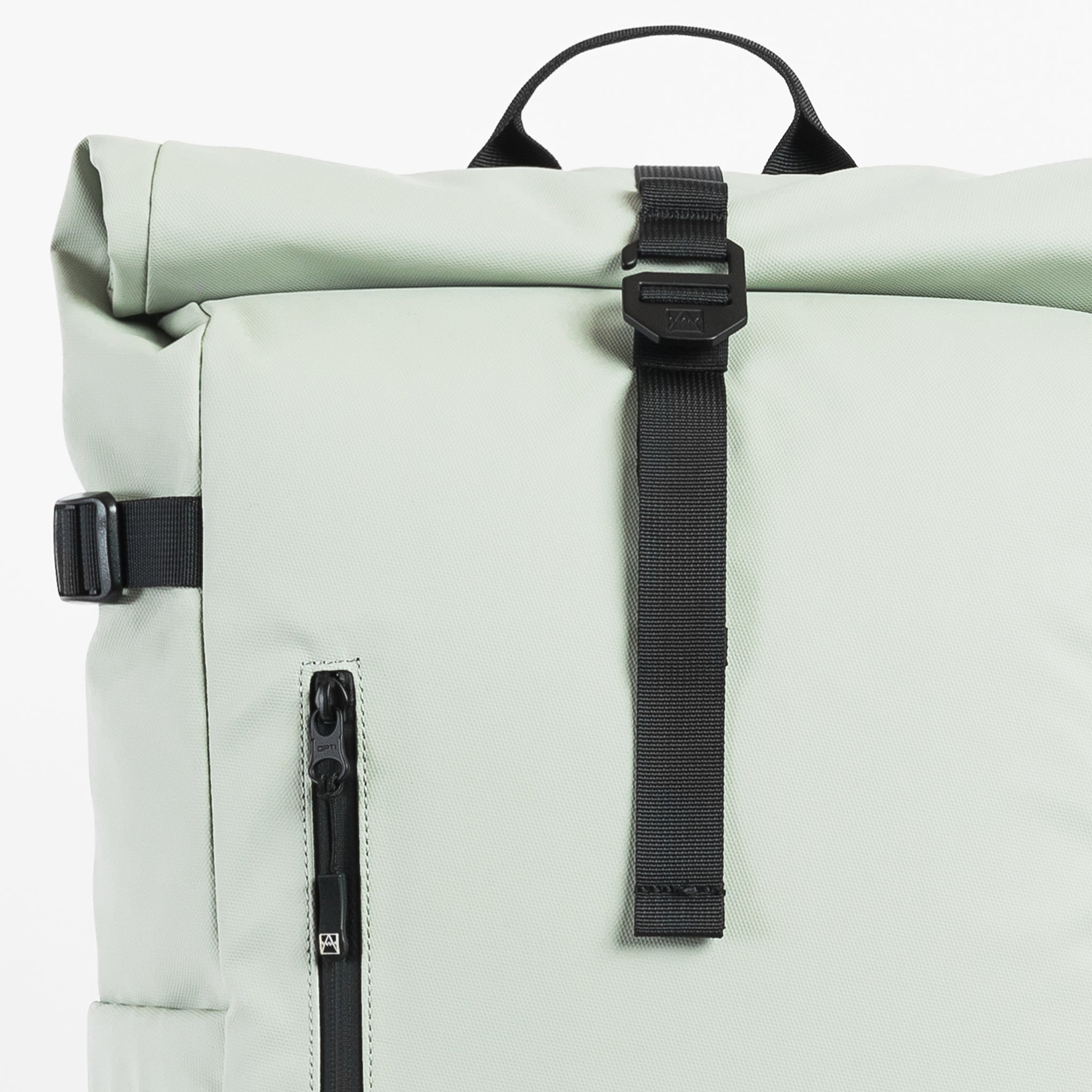 A studio shot of the roll and g-hook closure on the Soft Mint Roll Top 20L