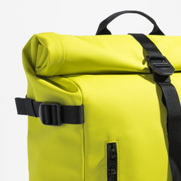 A studio shot of the close up of the roll on the Roll Top 20L in Volt