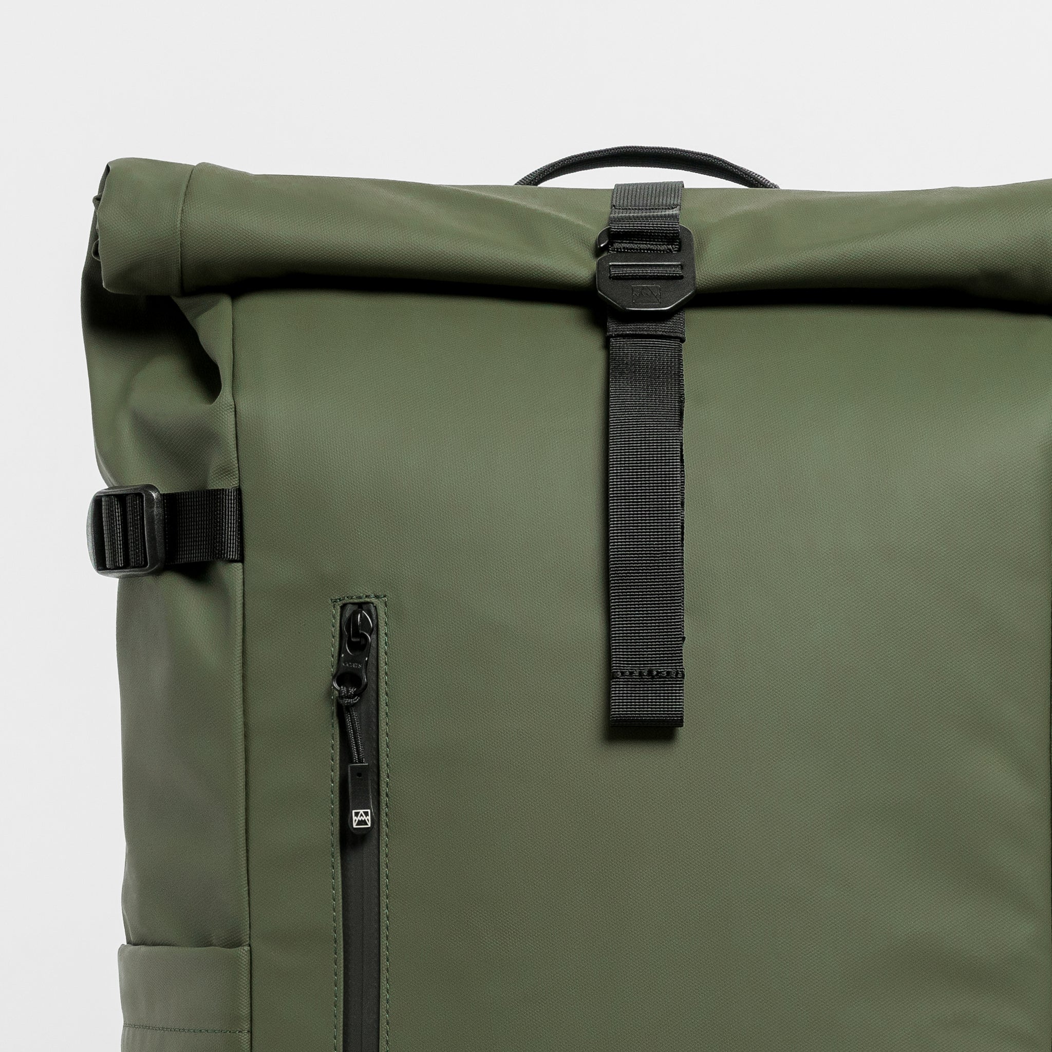 A close up of the g-hook and roll on the Urban Green Roll Top 30L