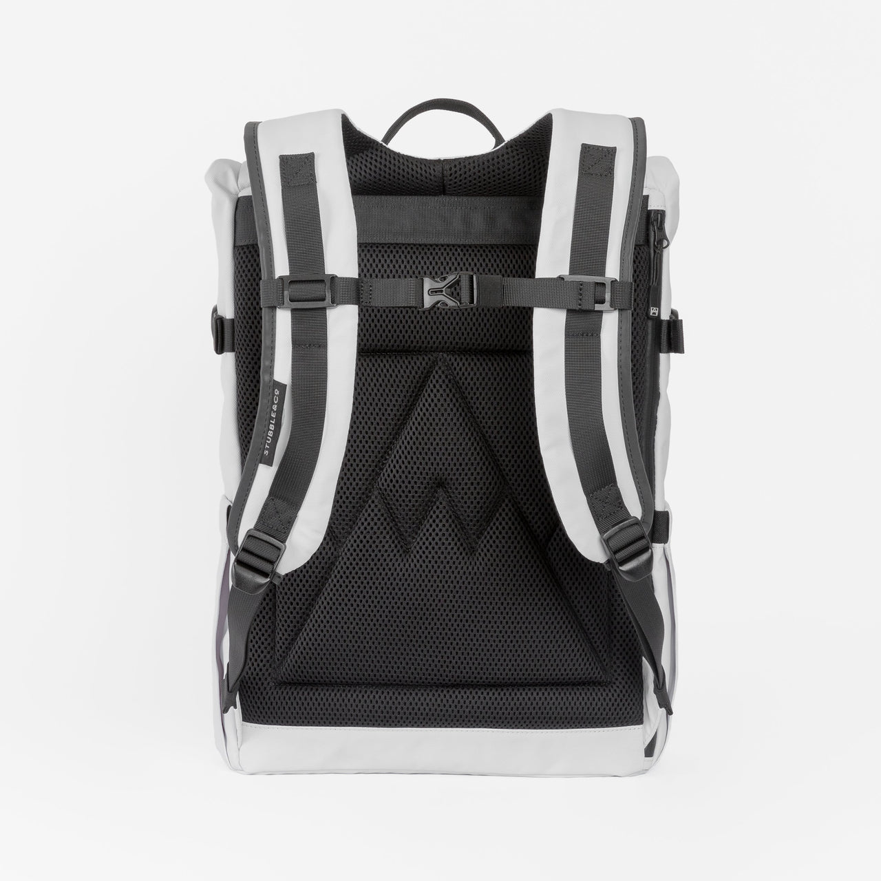 The back of the Roll Top backpack in Arctic White showing the chest straps