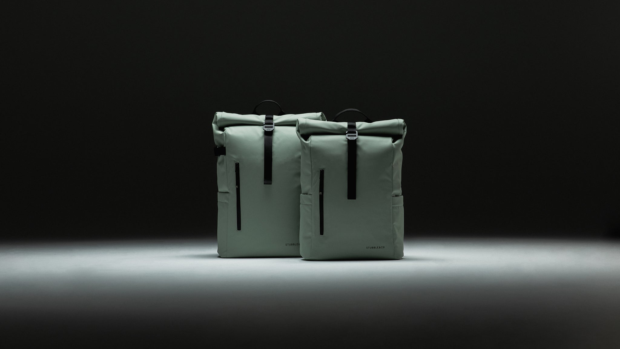 the roll top and roll top mini in matcha green colour sitting side by side