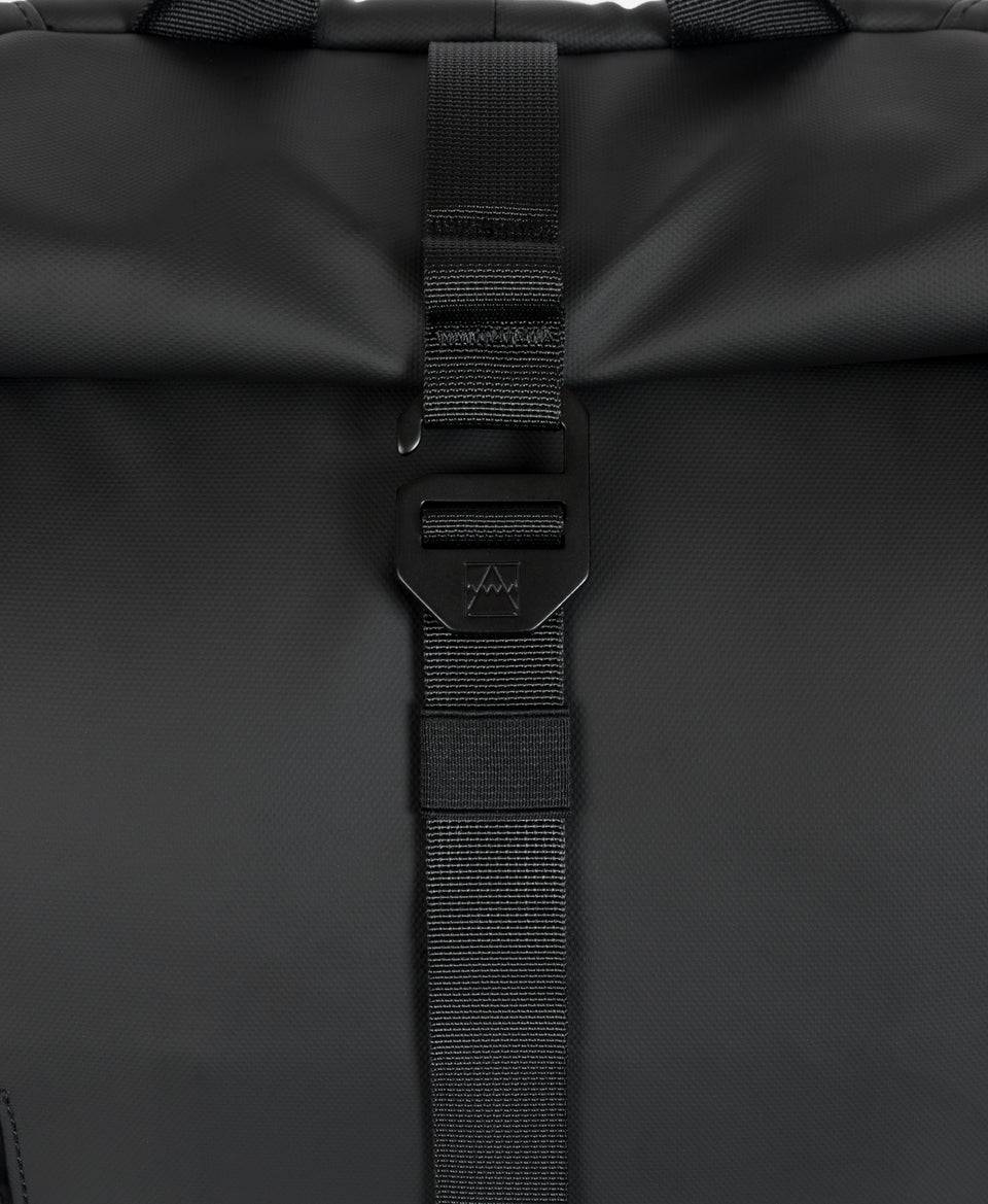 Roll Top backpack close up of g hook closure