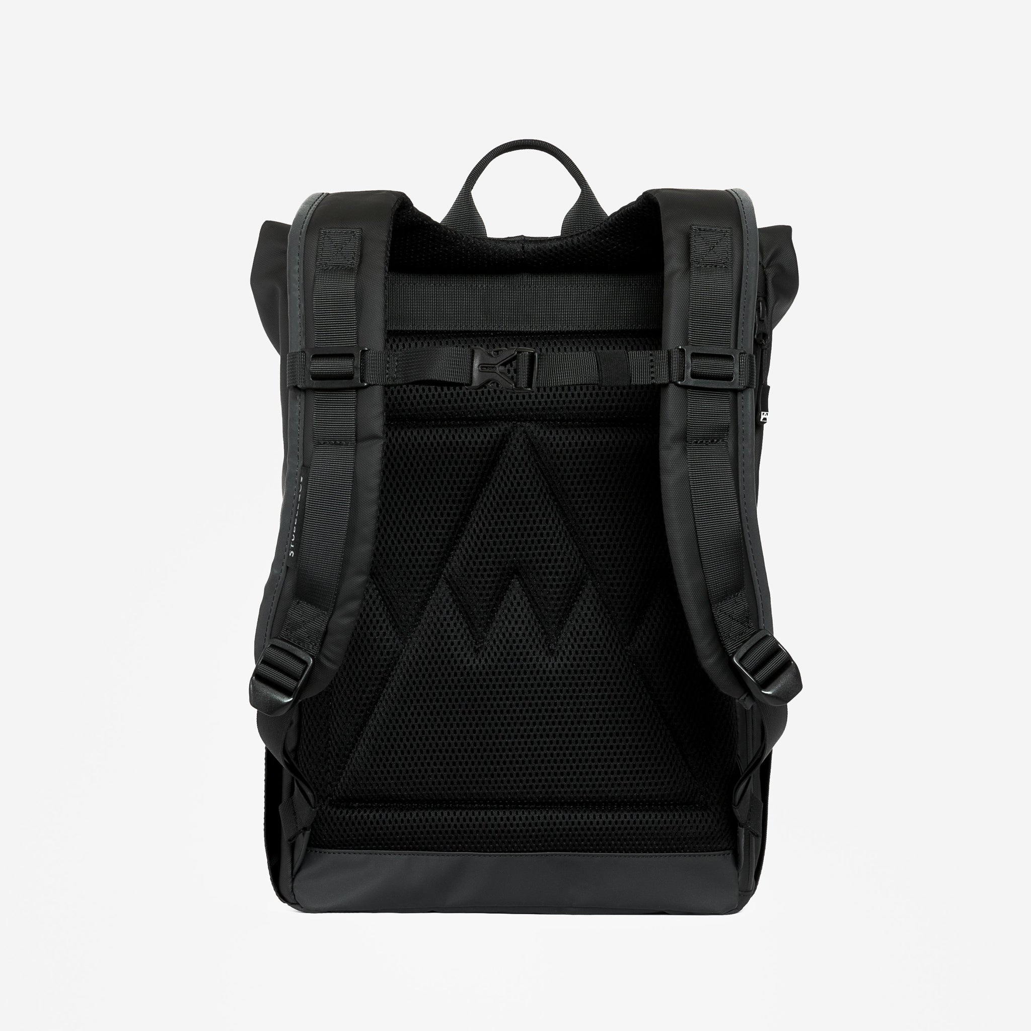 a studio shot of the back panel of an All Black roll top mini