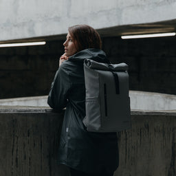 Women wearing Roll Top Mini backpack in Concrete