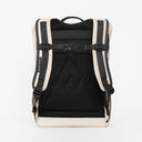 a studio shot of the back panel of the Sand roll top mini