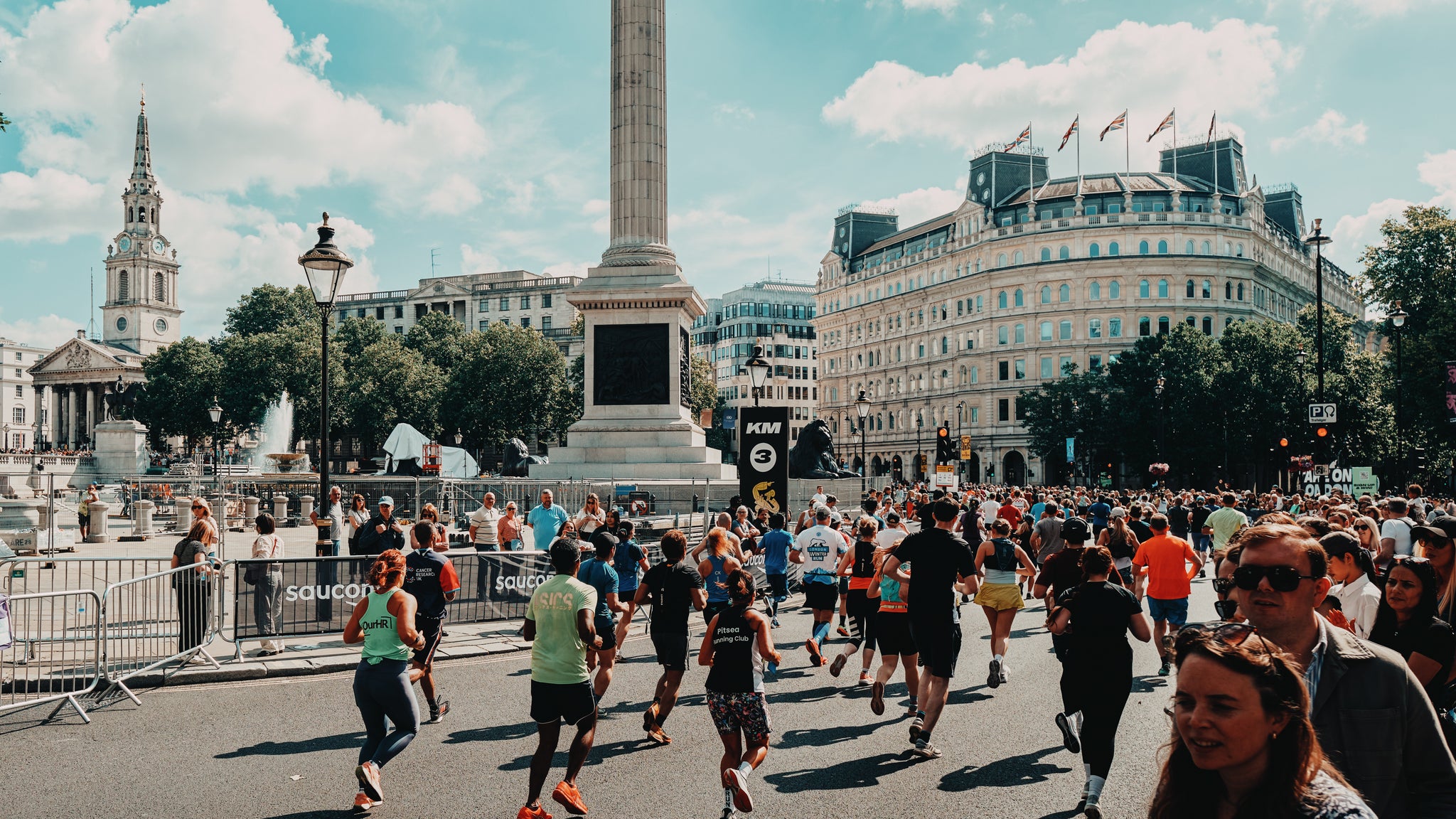 An image of trafalger square filled with runners during a running event