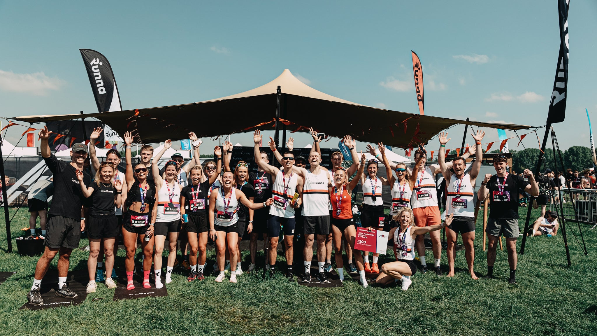 A shot of the team at RUNNA at the event of an event