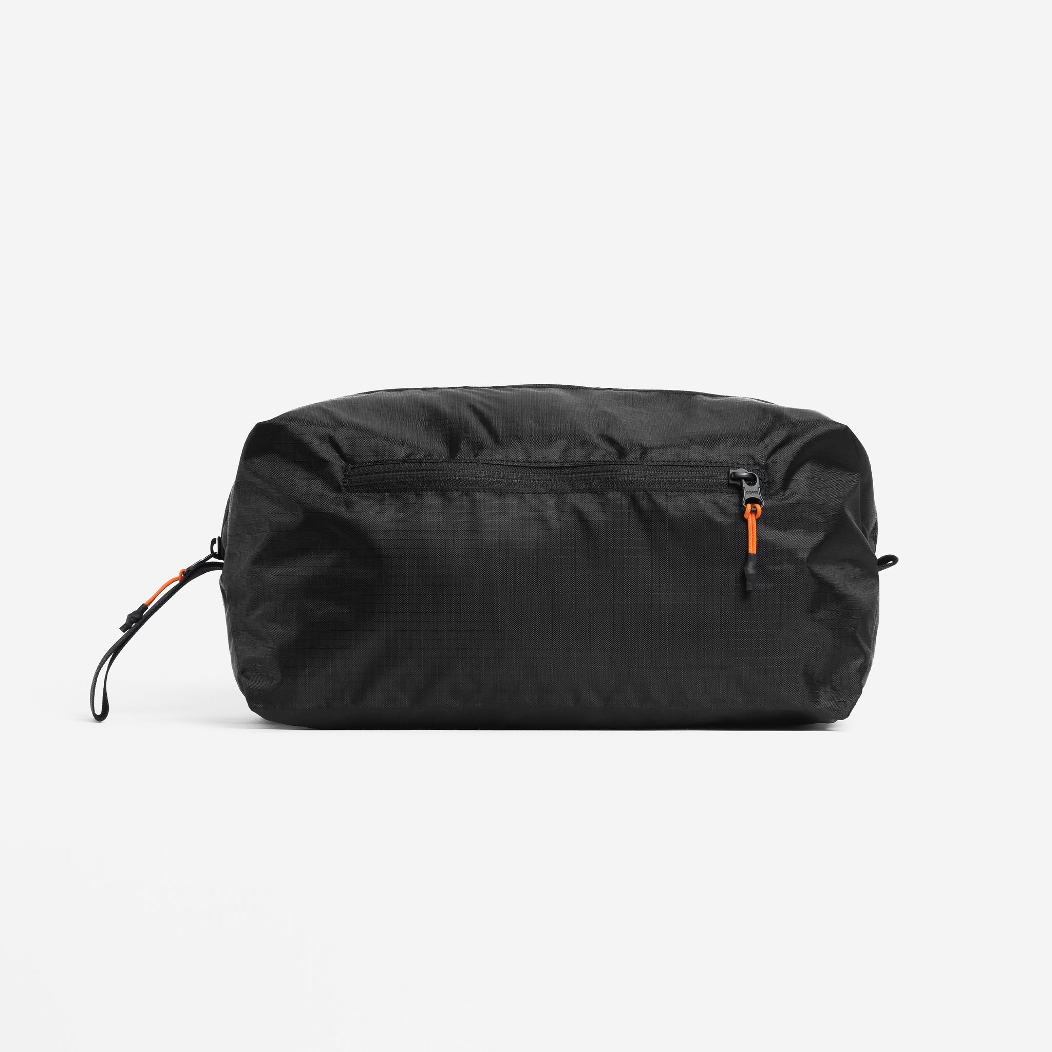 A studio shot of the back and back zip of the shoe bag in All Black