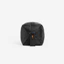 A studio shot of the end and grab handle of the shoe bag in All Black