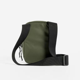 a studio shot of the back of an Urban Green shoulder bag