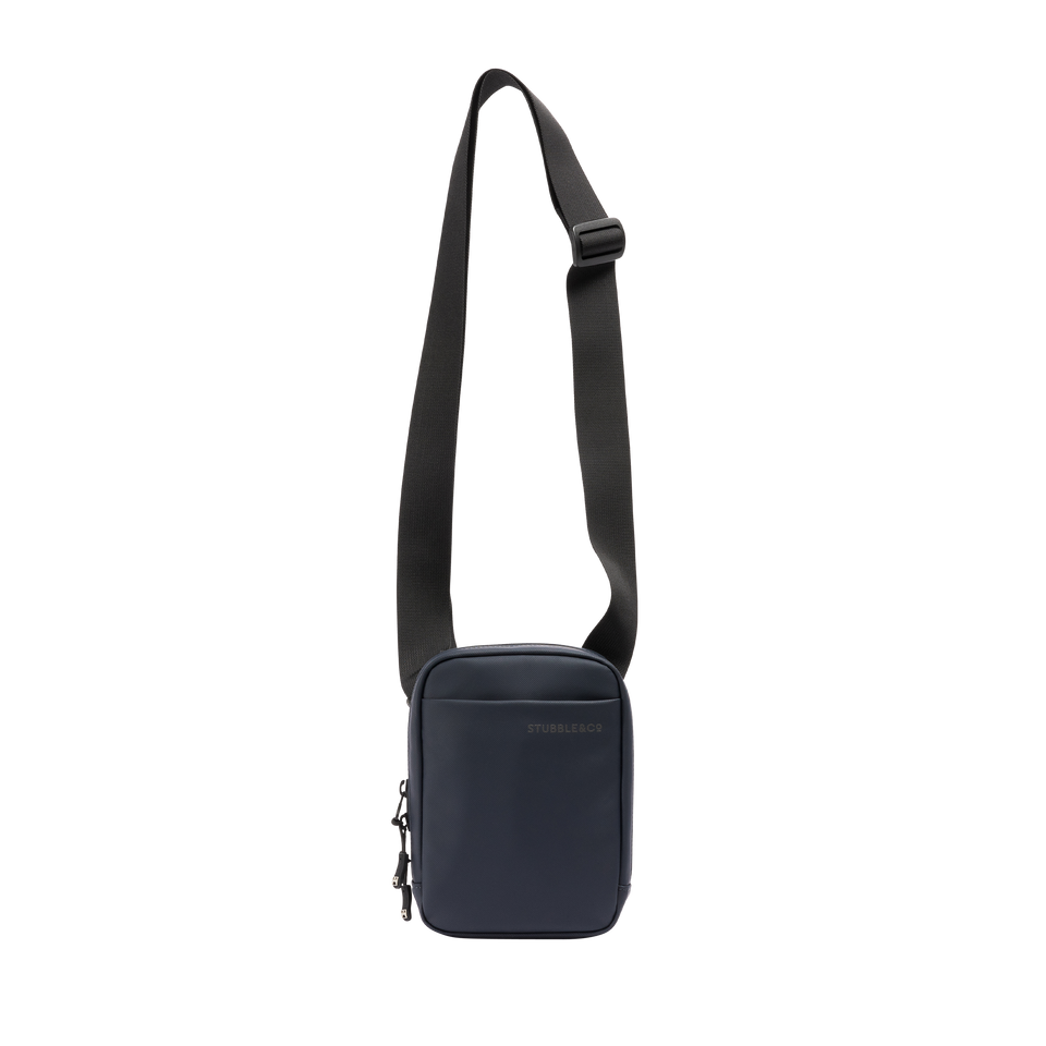 A studio shot of the front and side of a Shoulder Bagl as cut out transparent PNG-  midnight