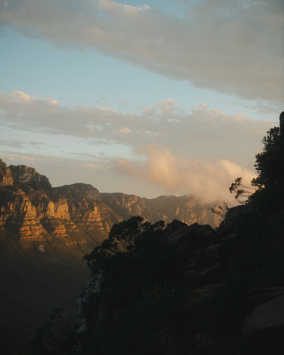 Sun setting over mountain scape in Cape Town