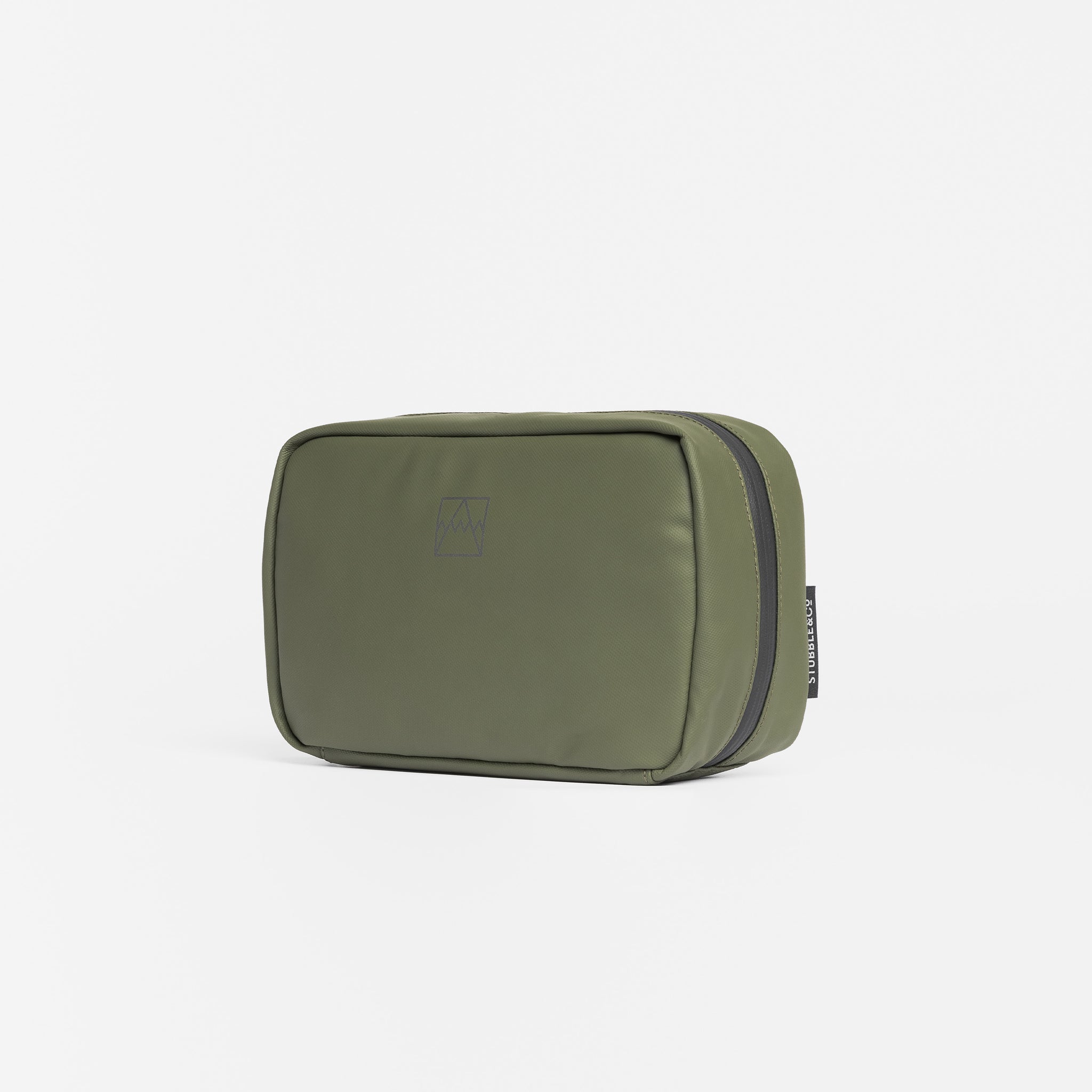 A studio shot of the front of the tech bag in Urban Green