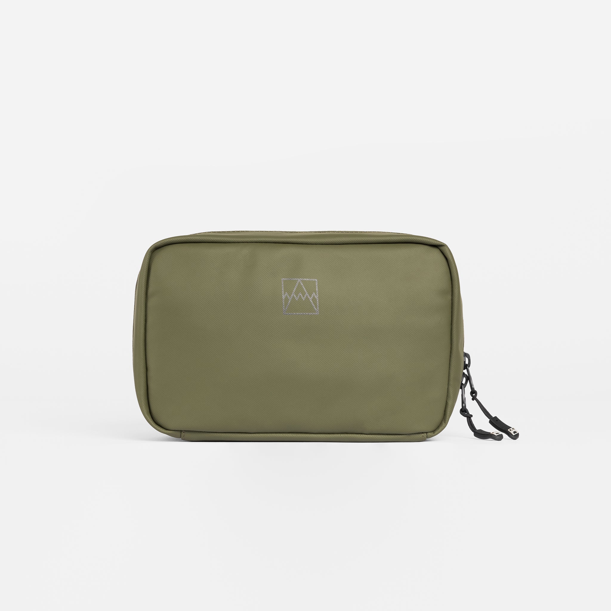 A studio shot of the front of the tech bag in Urban Green