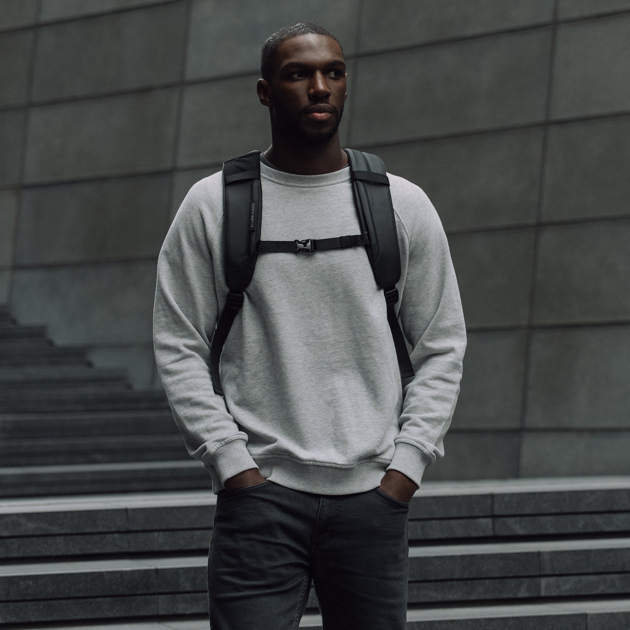 Man with All Black Everyday Backpack