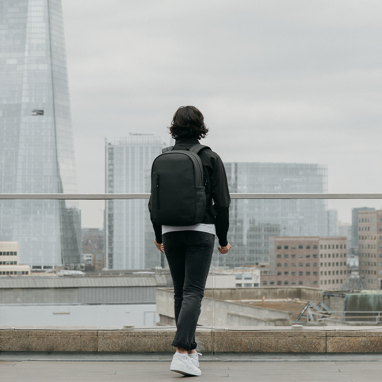 Women wearing All Black Everyday Backpack