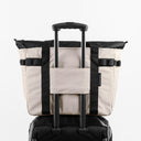 a studio shot of the back of Sand Tote Bag with the trolley sleeve